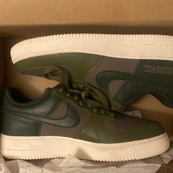 army green nike trainers